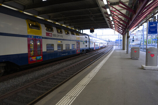 Diminishing perspective of platform at railway station of Swiss city of Winterthur on a summer sunset. Photo taken June 27th, 2026, Zurich Winterthur, Switzerland.