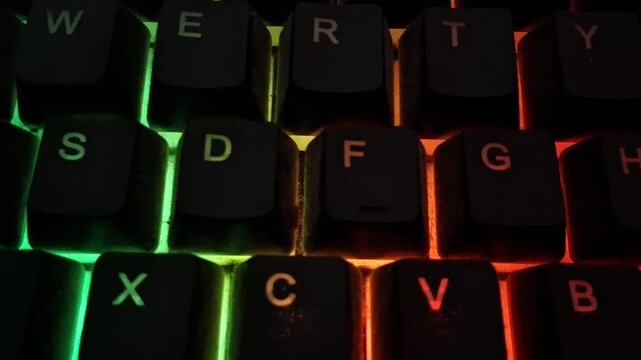 Mechanical gaming keyboard with colorful rgb backlight motion video footage