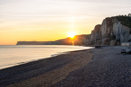 Beautiful coastal landscape of Yport near &Eacute;tretat with white cliffs pebble beach and breathtaking views along the Normandy coast of France.