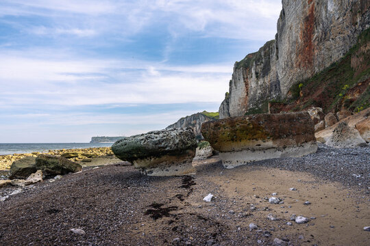Natural beauty of Yport near &Eacute;tretat with towering white cliffs and a scenic beach along the famous Normandy coast of France.