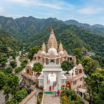 Vaishno Devi Temple Katra Jammu and Kashmir, Sacred Holy Shrine with White Gopuram Gateway in Misty Mountains, India
