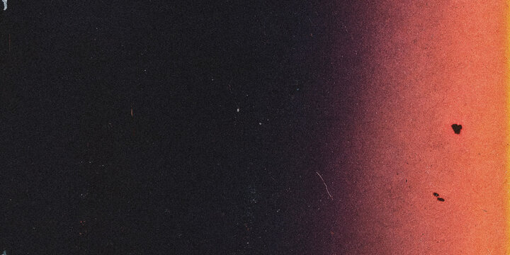 Gradient texture with grainy film effect dark to reddish orange color scheme grain reddish orange tone