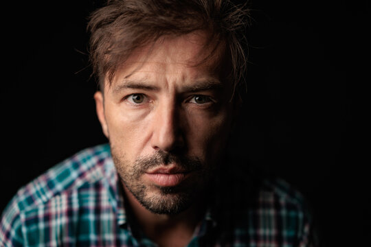 Intense casual man looking forward