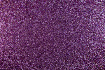 Fototapeta premium Purple glitter textured surface shimmering reflective sparkling abstract background