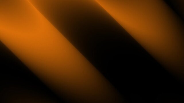 Orange light streaks moving across black background. Abstract motion blur effect with glowing yellow golden rays animation