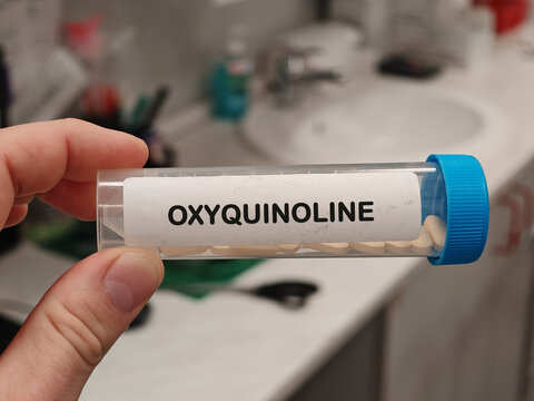 OXYQUINOLINE antimicrobial quinoline derivative for intestinal and vaginal infections box in pharmacy laboratory