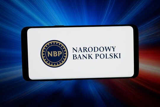 Stuttgart, Germany - 06-22-2026: In this photo illustration, the logo of central bank Narodowy Bank Polski (NBP) is displayed on a smartphone in front of abstract background on computer screen.