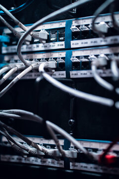 View of network cables connected to a server rack patch panel in a data center in Los Angeles, California, United States.