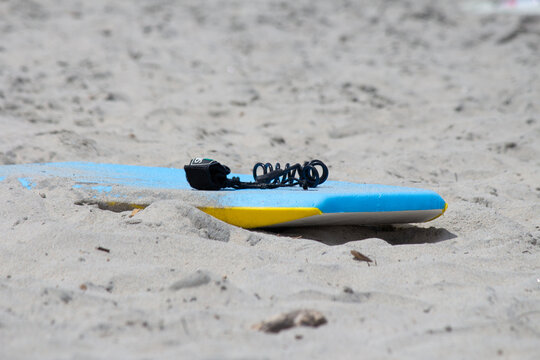 Boogie board on the beach laying in the sand ocean vacation