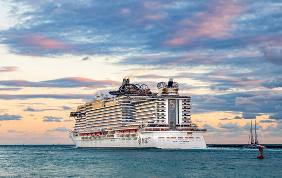 Miami, Florida, USA - December 23, 2024: MSC Seaside cruise ship voyage. Cruise in summer vacation. MSC cruises cruise line. Cruise ship tour and travel at sunset sea. Ship clearing the port