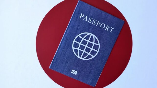 Japanese passport or id document with tickets for flight, travel, border crossing. Japan passport and tickets as a background for your design