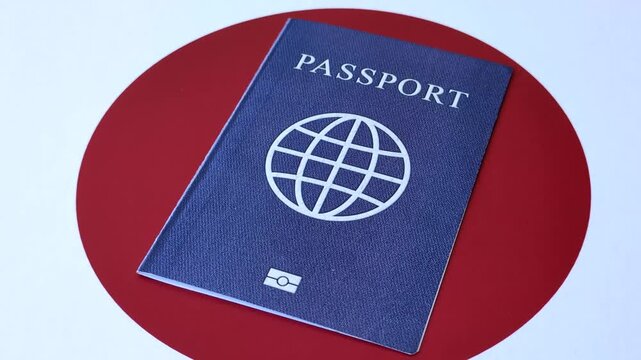 Japanese passport or id document with tickets for flight, travel, border crossing. Japan passport and tickets as a background for your design