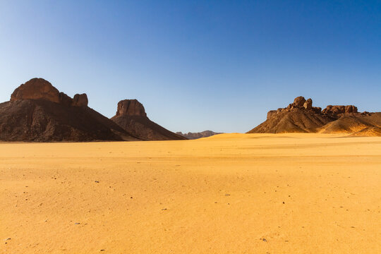 Sahara landscape. Rock towers in the Immourouden tourist region. Tassili n'Ajjer National Park. The Sahara Desert. Algeria.