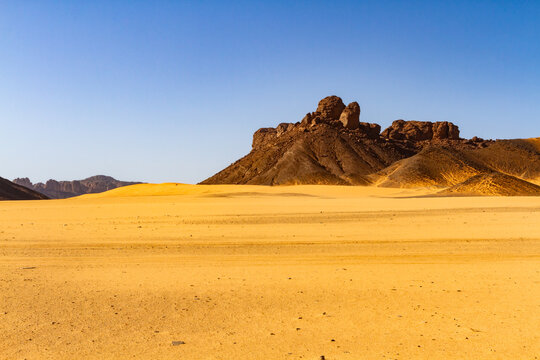 Sahara landscape. Rock towers in the Immourouden tourist region. Tassili n'Ajjer National Park. The Sahara Desert. Algeria.