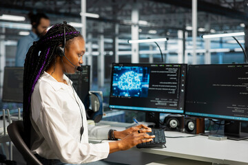 Fototapeta premium Software developer wears a headset in a server room, using artificial intelligence troubleshooting to assist users.