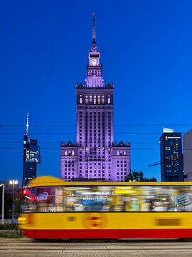 Old tram passes by Palace of Culture and Science, Warsaw