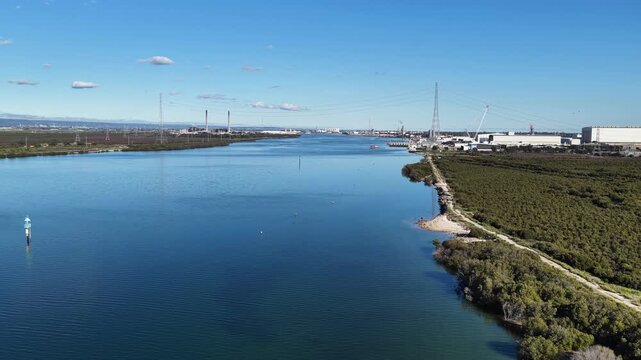 Osborne, Adelaide, South Australia &ndash; 4K aerial drone footage of Port Adelaide River, Torrens Island, industrial waterfront, ASC Shipyard, maritime facilities and coastal wetlands.