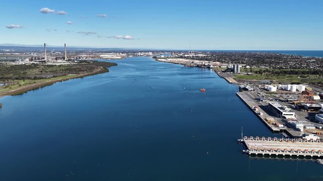 Osborne, Adelaide, South Australia &ndash; 4K aerial drone footage of Port Adelaide River, Torrens Island, industrial waterfront, ASC Shipyard, maritime facilities and coastal wetlands.
