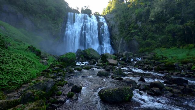 Marokopa Falls Cascading Over Large Rocky Tiers in Waikato New Zealand