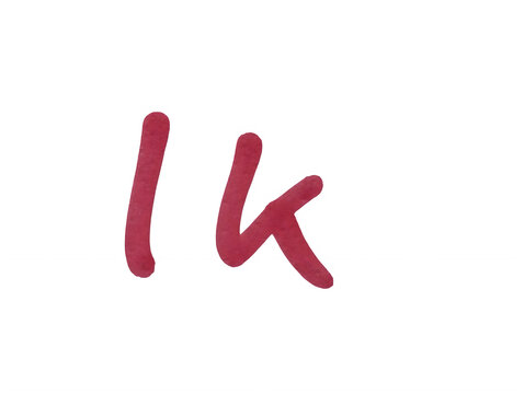 Handwritten letters lk in red ink on a simple textured paper surface isolated on transparent background
