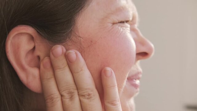 unhappy Mature woman holding painful ear, agony earache grimace, suffering health problems, sharp pain issue, ringing auditory hallucinations, hearing perception, mental health, unusual sounds