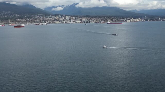 Aerial of a Seaplane Taking Off in Vancouver Harbour Canada