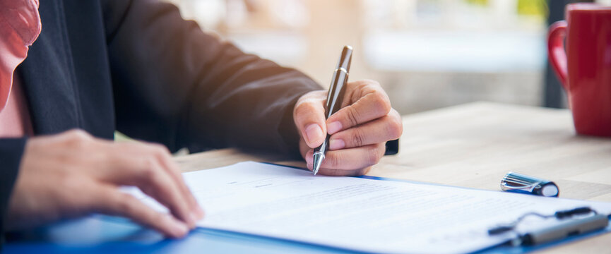 Banner Woman hands pen workspace. Woman hands pen writing notebook. hands pen writing notebook planing meeting excel graph chart. Banner Time management business strategy document with copy space