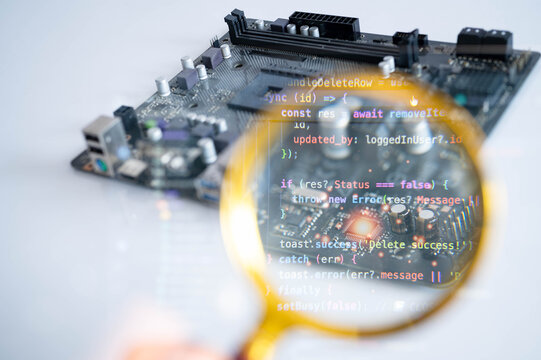 Magnifying glass inspecting electronic circuit on computer motherboard with software code overlay, representing cybersecurity, embedded systems, semiconductor engineering, programming and technology.