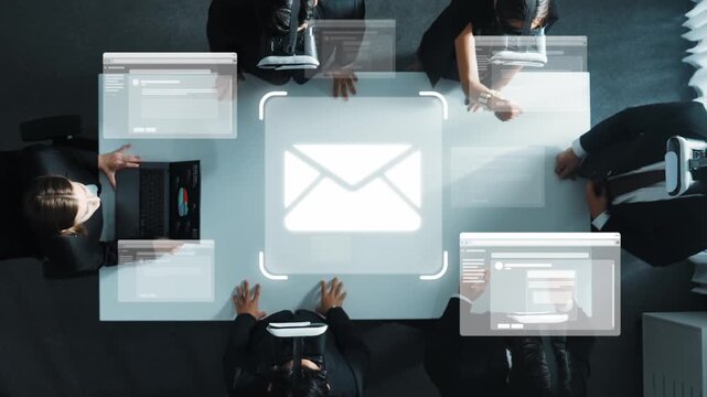 Overhead view of a modern business meeting with professionals collaborating around a table, utilizing technology and digital interfaces to enhance communication and workflow. Raster
