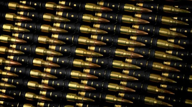 Tactical military equipment and defense supplies on rotating display for specialized security training concept in 4K Ultra HD footage.
