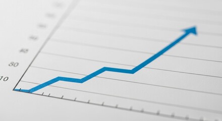 Obraz premium Bold Blue Upward Trend Line on White Graph Paper Displaying Business Growth and Financial Analysis