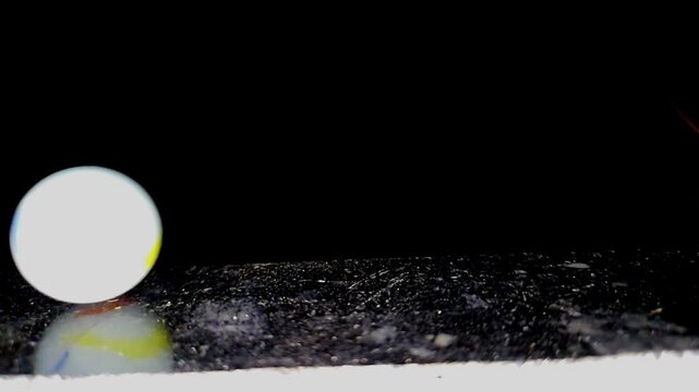 Glass Sphere Rolling Across Black Marble Surface in Slow Motion, Physics, Gravity, Motion, Balance, Minimal Abstract Background, Precision Movement