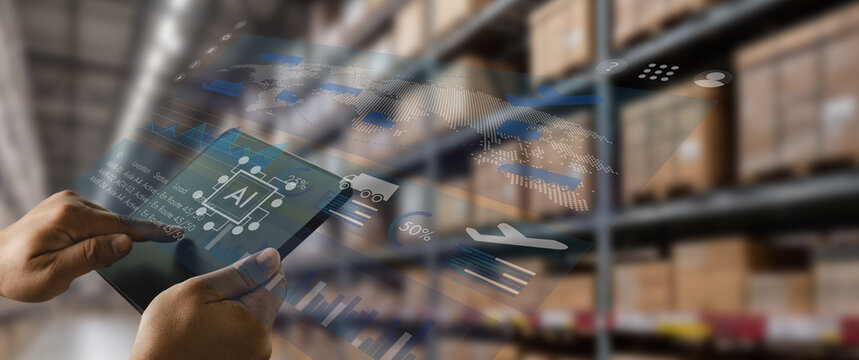 man hold a transparent tablet in a warehouse, monitoring inventory and logistics data through an AI dashboard for stock tracking, shipment analysis, and supply chain management tasks.