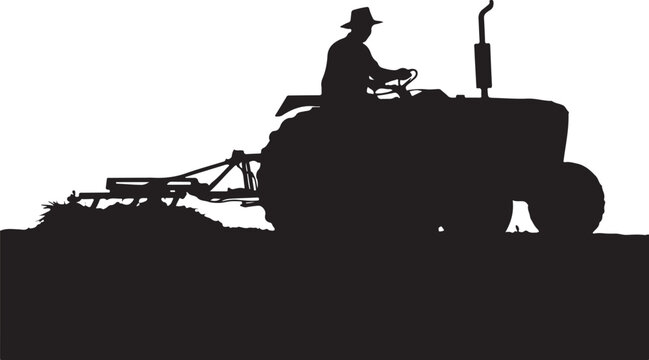 Silhouette of a farmer driving a tractor with a hay rake