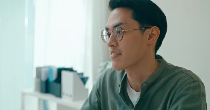 Closeup group Asian businesspeople work together discuss plan idea with investment profit sale statistics in business meeting in office. Financial generation z team brainstorm on e-Commerce project.