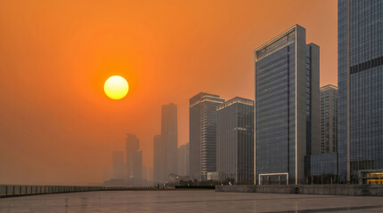 Fototapeta premium Sunset city skyline heatwave risk climate urban haze modern office building reflection water. Warming hazard emergency. climate change warning, temperature drought, weather hot summer