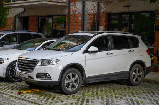 June 24, 2026, Tbilisi, Georgia White Haval H6 SUV with Chrome Grille Side and Front View