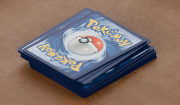 Pile of English Pokemon Trading Cards, reverse side. Pokemon TCG Collecting