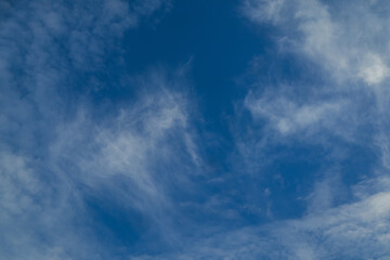 Obraz premium Wispy Clouds in a Blue Sky