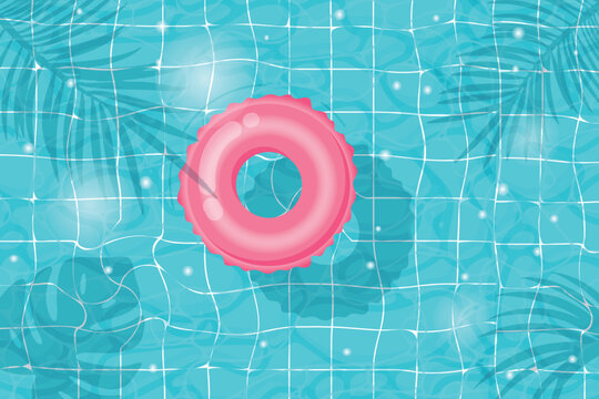 Pink inflatable swimming ring floating in pool blue tiled bottom and palm leaf shadows summer resort, poolside relaxation and vacation concept