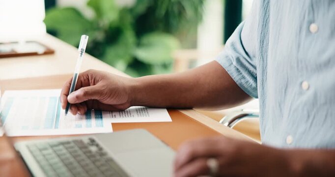 Man, hands and writing with laptop in home for finance, budget planning or tax deduction. Male person, accounting or remote work with paperwork, documents or computer for financial audit in house