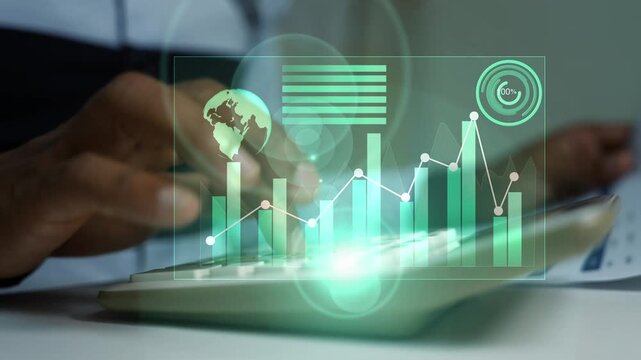 Close-up of hands using a calculator with glowing hologram digital finance charts on the virtual screen, Business analysis growth budgeting and modern data planning in an office setting