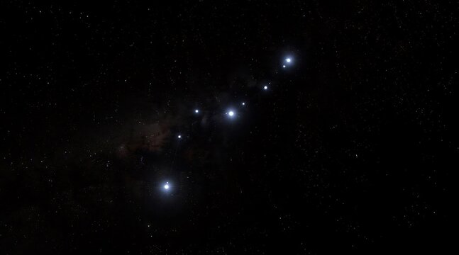 Orion constellation stars shining in the dark night sky.