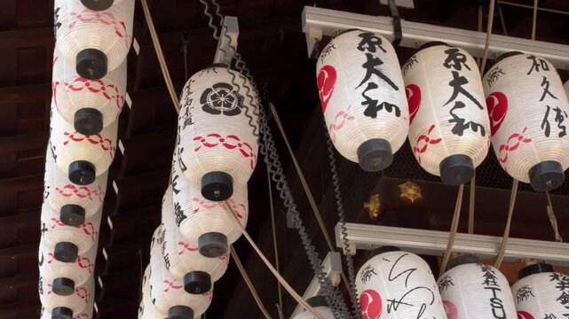 Traditional Japanese Paper Lanterns Hanging at a Kyoto Shinto Shrine