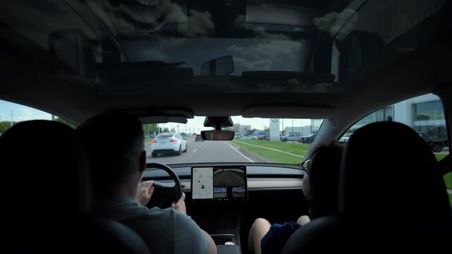 Wide POV inside vehicle during drive.