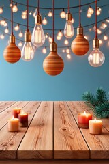Fototapeta premium Warm Christmas lights and candles over a wooden table for cozy holiday decor scene