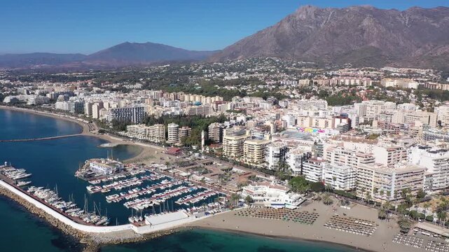 Aerial drone perspective of beautiful over luxury Puerto Banus Bay in Marbella, Costa del Sol. Spain 