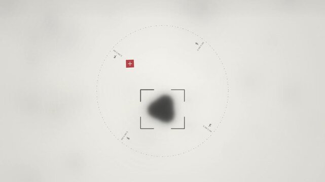 Futuristic digital targeting interface tracking a dark floating object