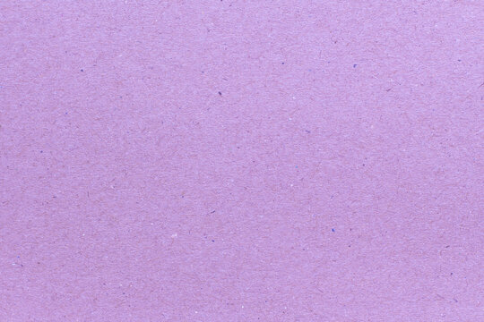 Purple paper  background texture light rough textured spotted blank copy space background in blue