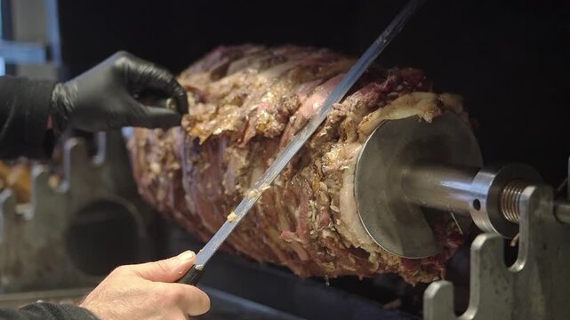 Cag Kebab, a traditional Turkish dish featuring lamb slow-roasted horizontally over a wood fire